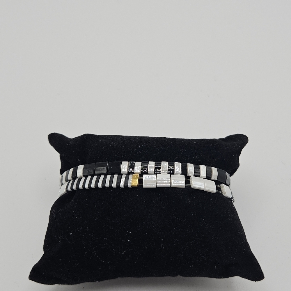 BPD pair of Pixie stretch bracelets black white gold